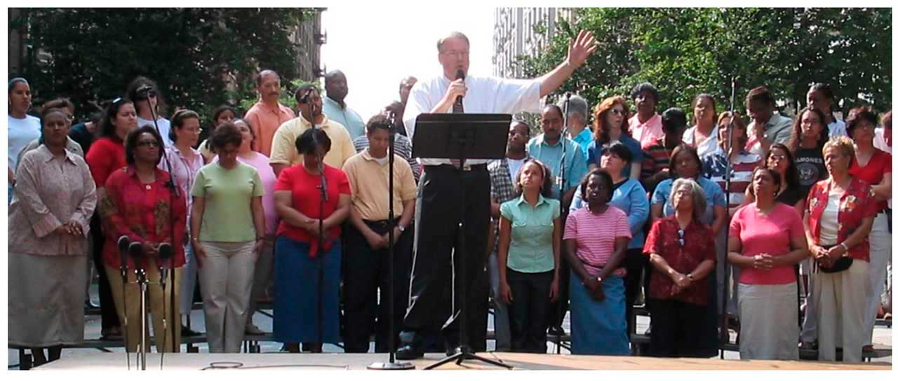 Chris White Speaking on 114th Street in Manhattan (Photo by Dan Voll) Chris White Speaking on 114th Street in Manhattan (Photo by Dan Voll)